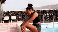 Ebony babe reveals her tiny tits outdoor