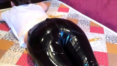Squeezingmy ass in shiny vinyl pants