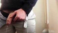 Thick uncut cock pissing